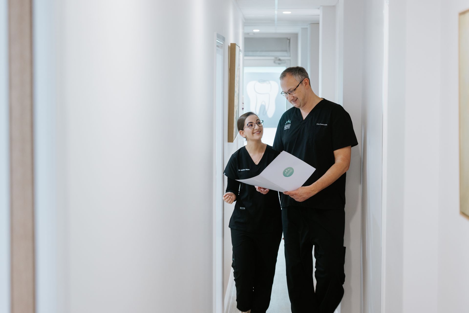 A Surgeon Wearing a Mask is Working on a Patient — Coronation House Dentist in Nambour, QLD