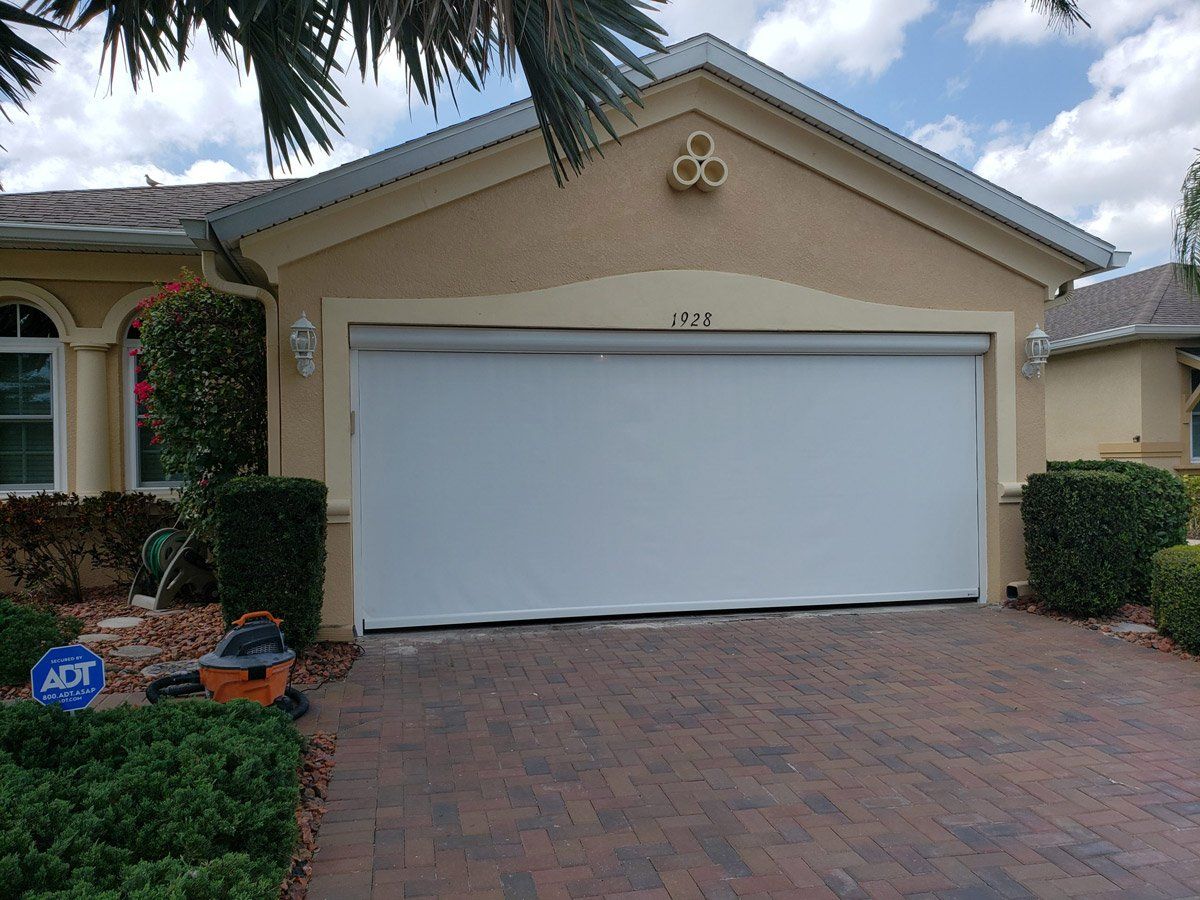 Garage Door Entrance Screens— Tampa Bay, FL — West Shore Shade