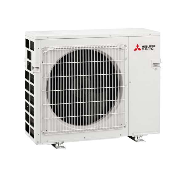 A white mitsubishi air conditioner is sitting on a white surface.