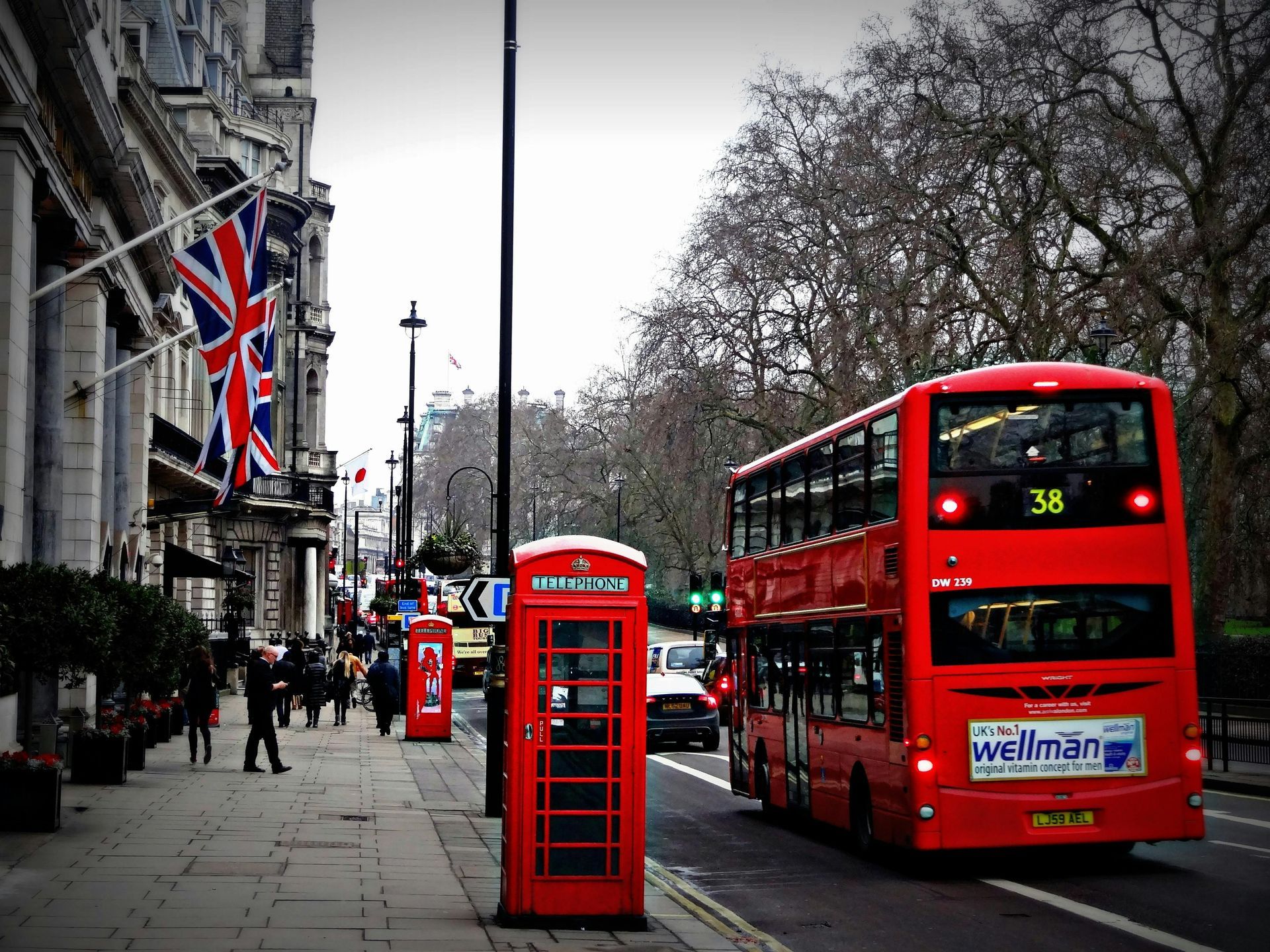 A red double decker bus with the number 34 on the back