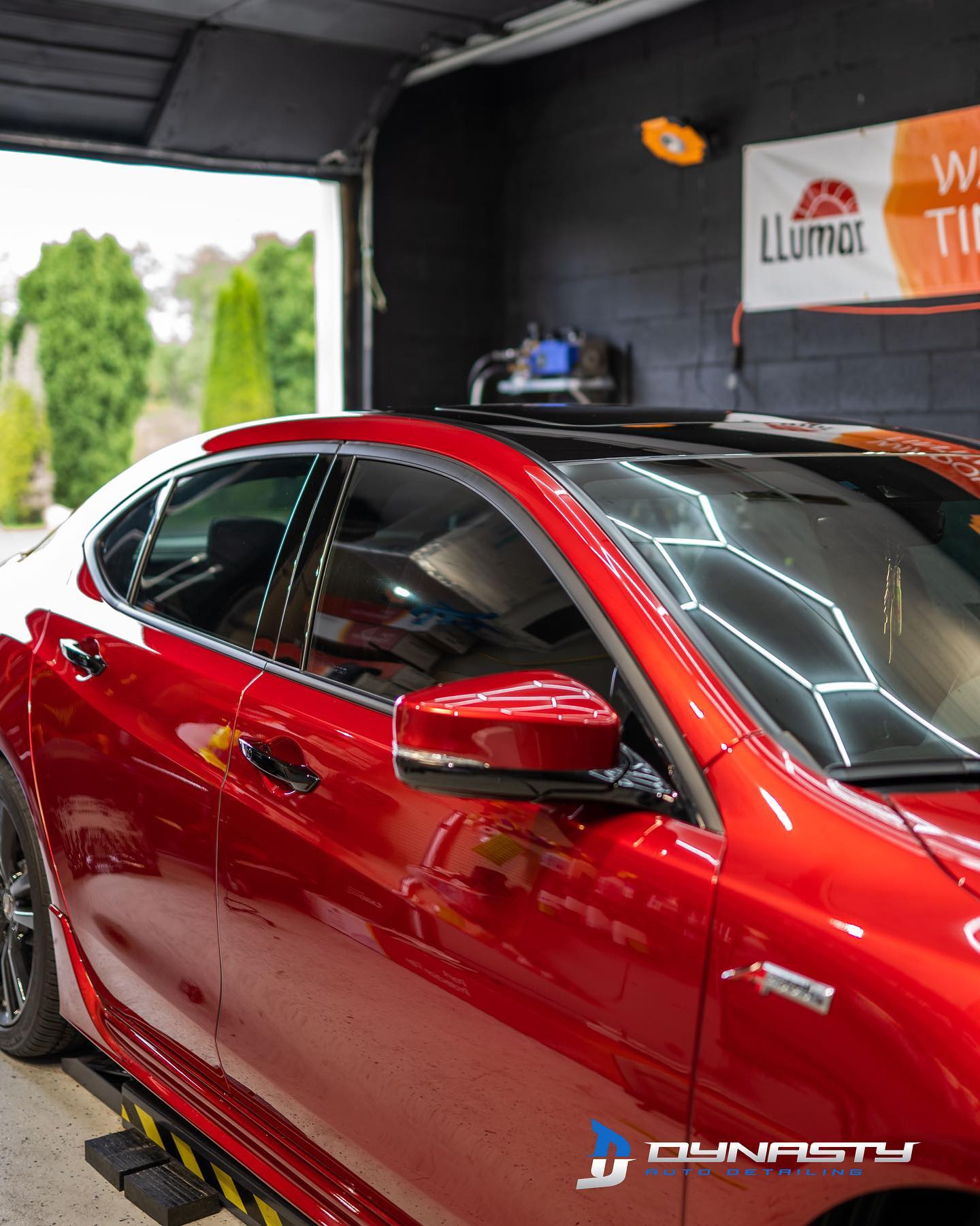 red car with window tint