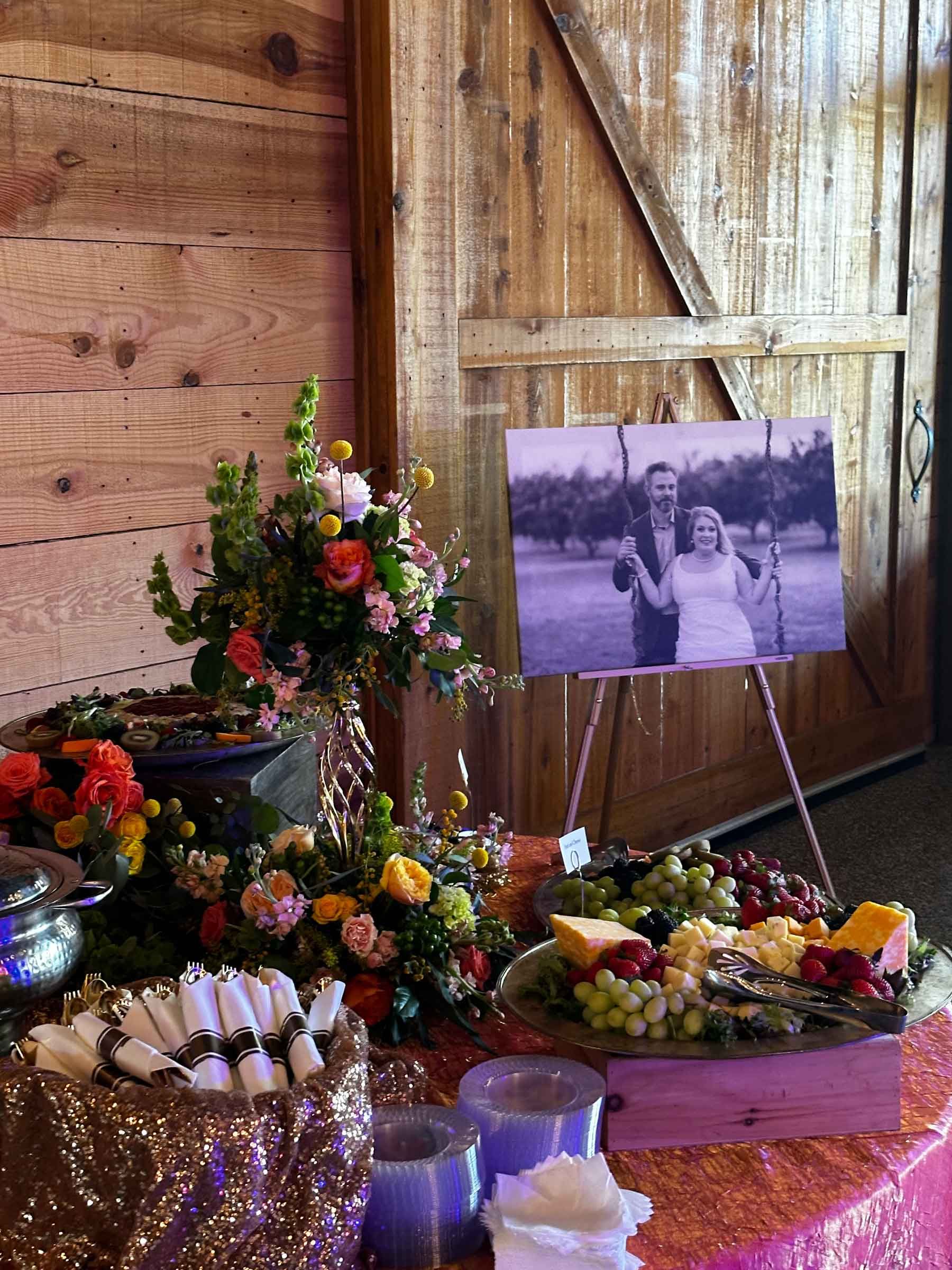 A table with a picture of a bride and groom on it.