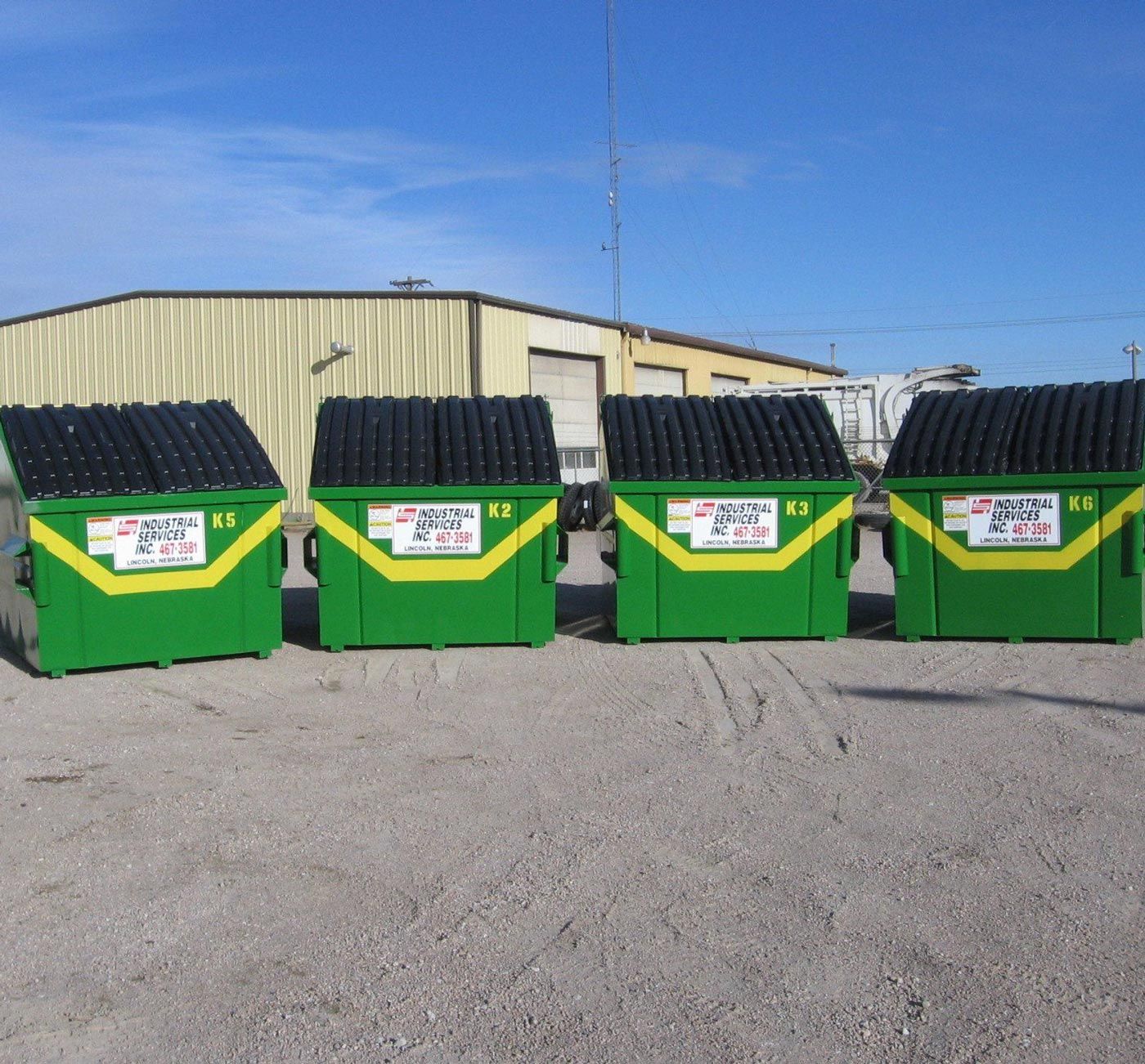 Four Commercial Dumpsters — Lincoln, NE — Industrial Services Inc.