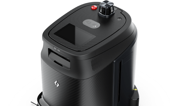 A black object with a red button on the top of it