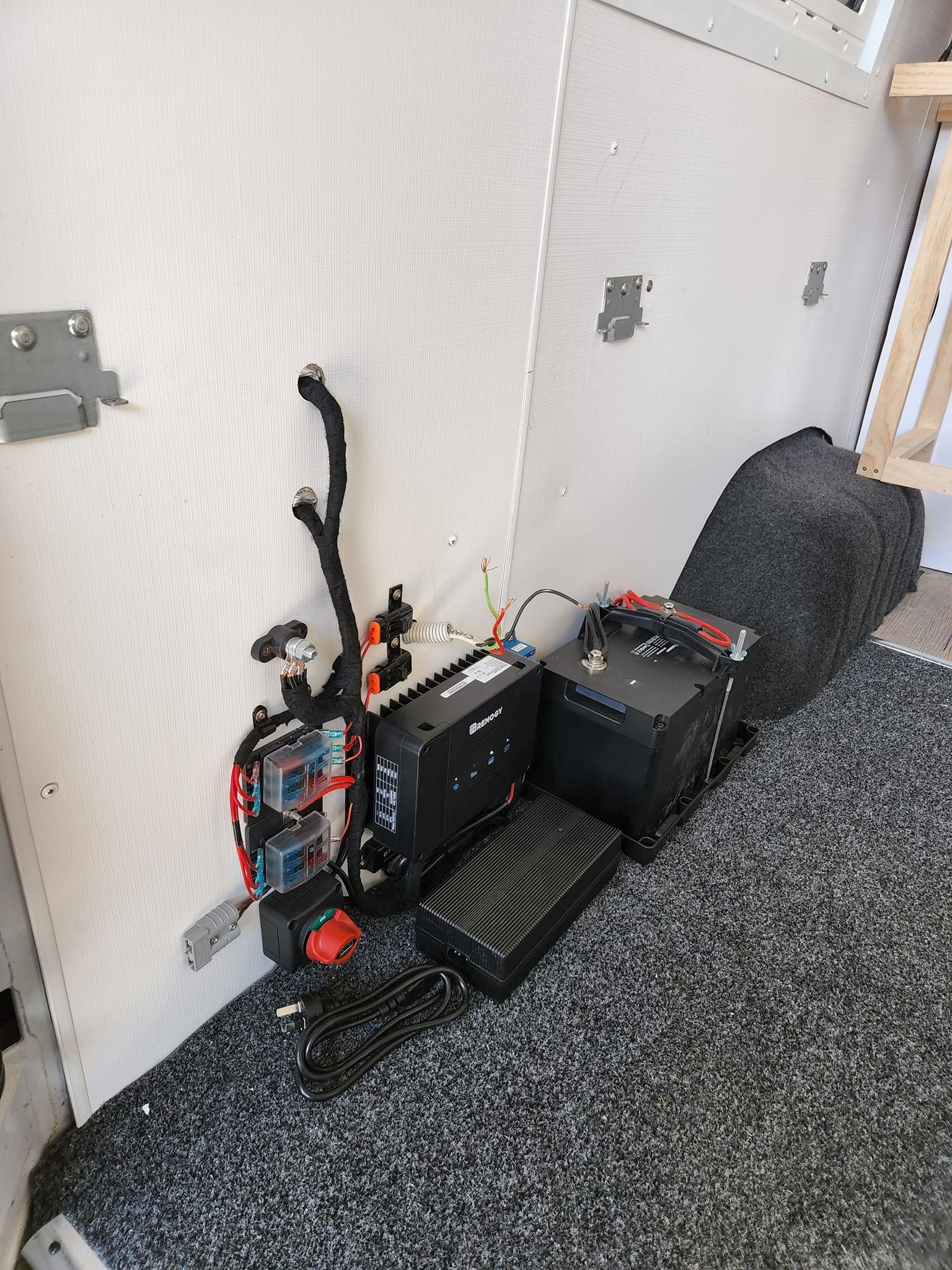 A Man Is Working on The Roof of A Rv — Genesis Automotive Services in Lavington, NSW