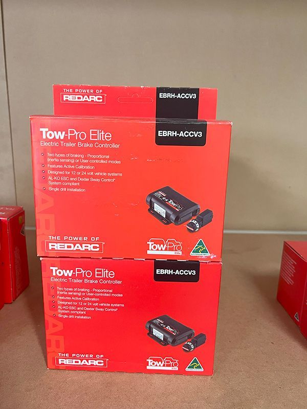 Two Boxes of Tow Pro Elite Are Stacked on Top of Each Other — Genesis Automotive Services in Lavington, NSW