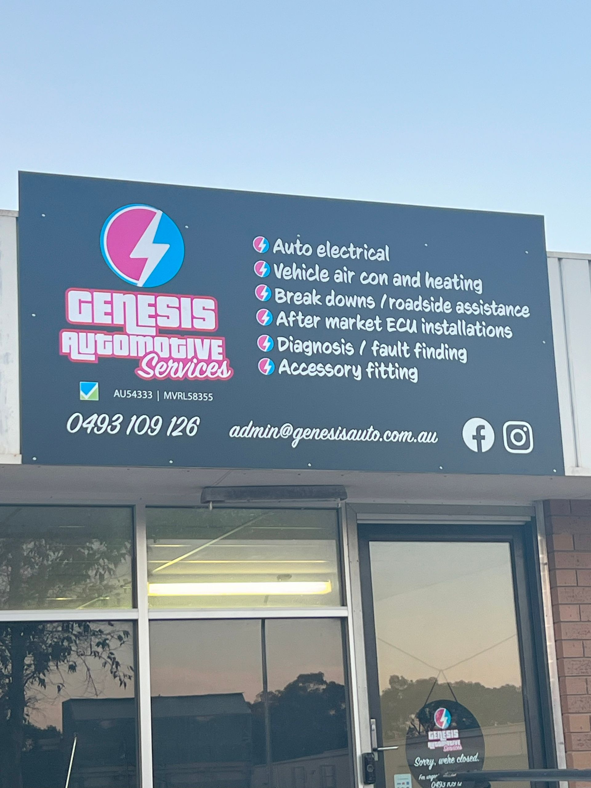 The Front of A Building With A Sign — Genesis Automotive Services in Lavington, NSW