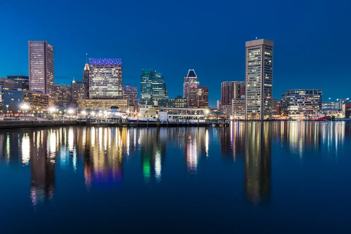 city skyline next to body of water