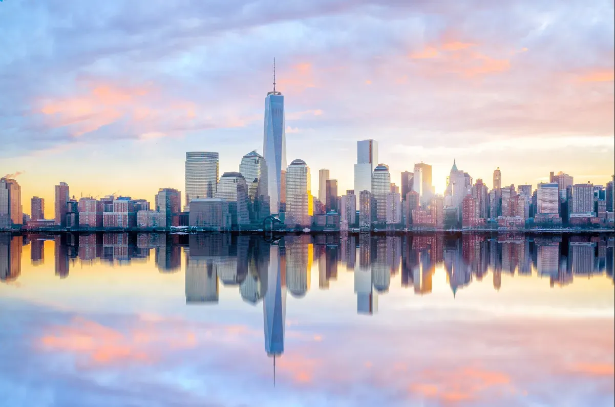 city skyline next to a body of water