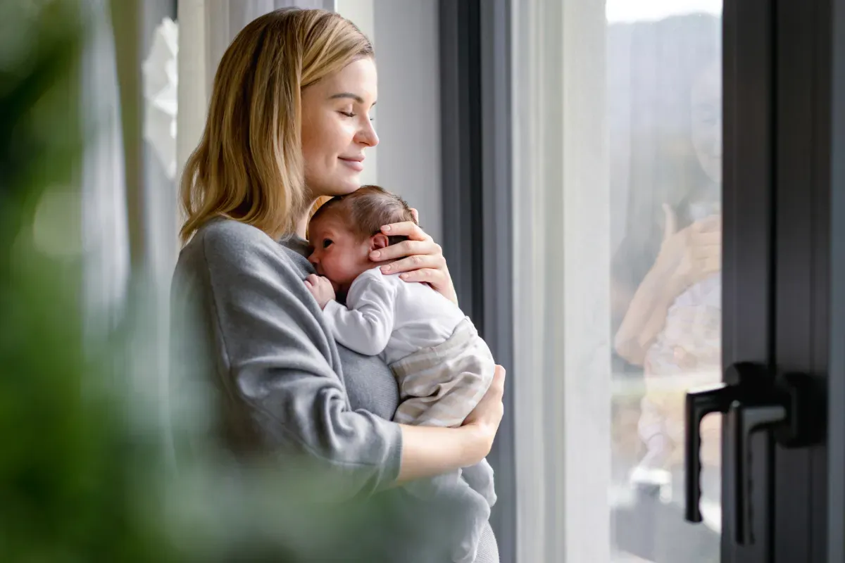 woman holding baby