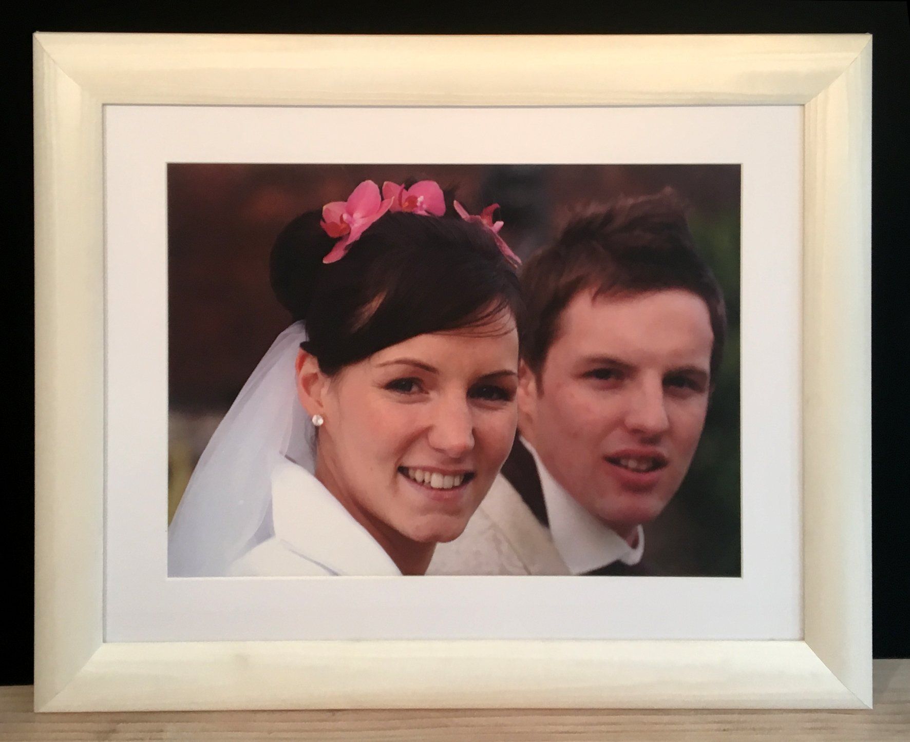 D & B wedding day in white fabric frame