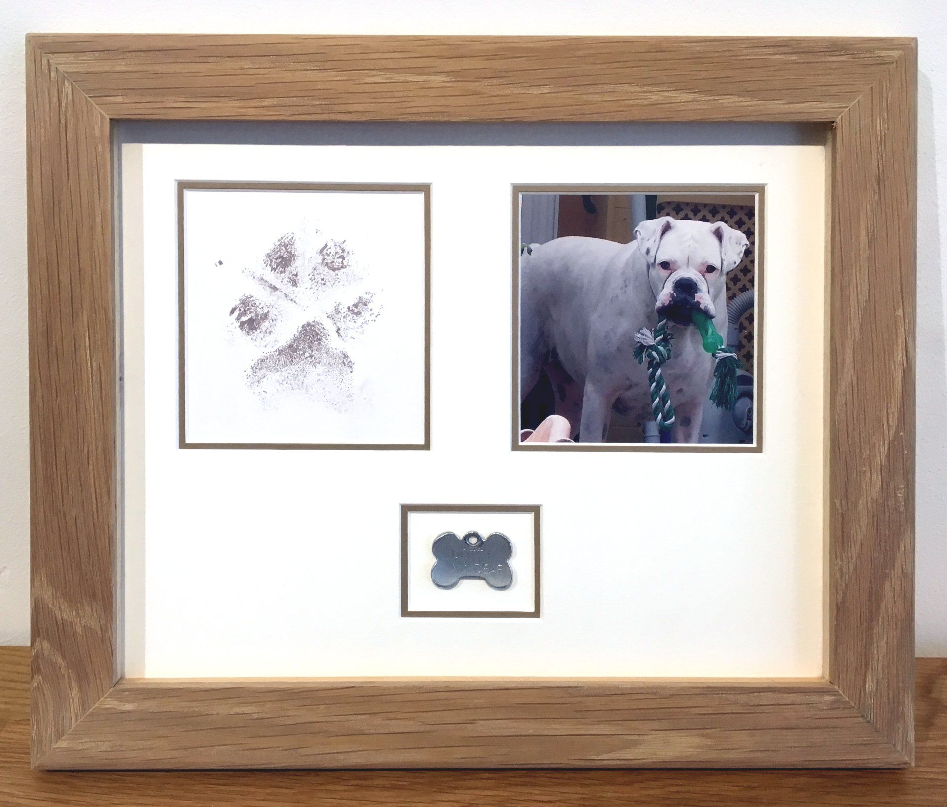 Paw print and Tag display of a much missed pet dog
