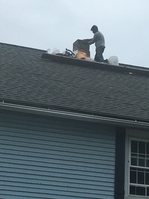 Man Fixing Roof — Fishkill, NY — Honest Reliable Roofing