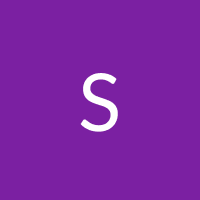 The letter s is on a purple background.