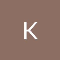 The letter k is on a brown background.
