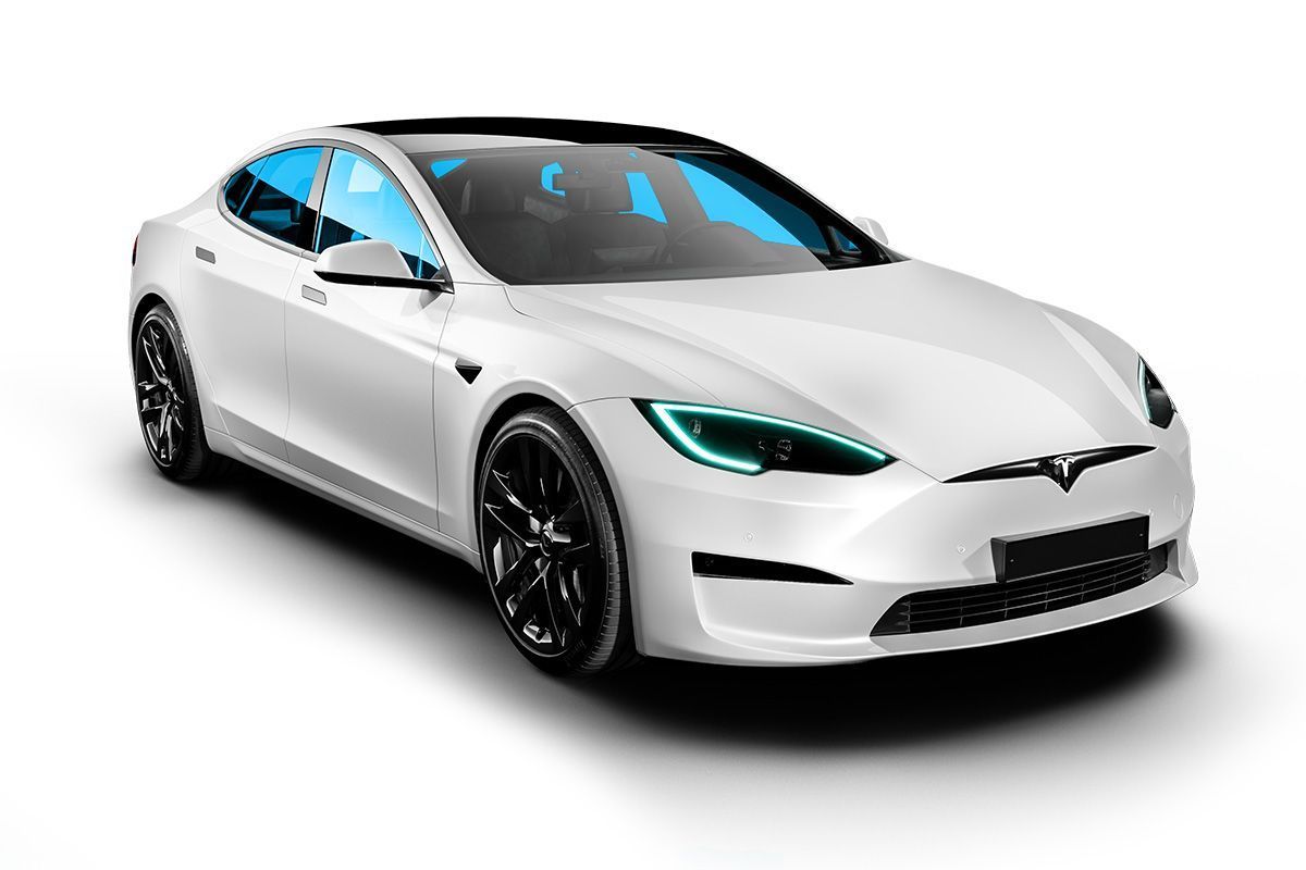 White Tesla sedan with tinted blue windows and black wheels. Fuquay-Varina, NC