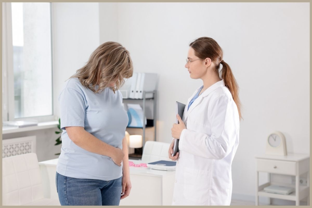 woman facing her dietician