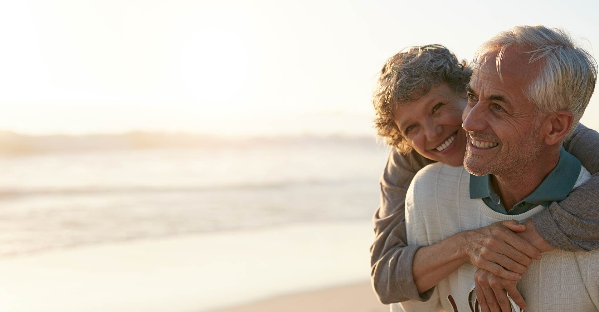 man and woman smiling
