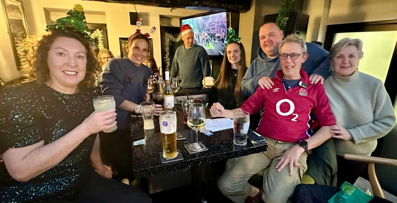 Two wine bottles with labels reading