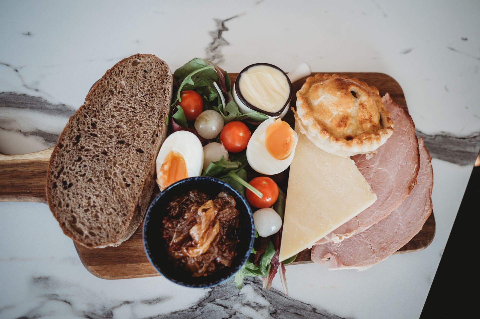 Champagne being poured into three flutes, sparklers, celebration, sparkling dress.