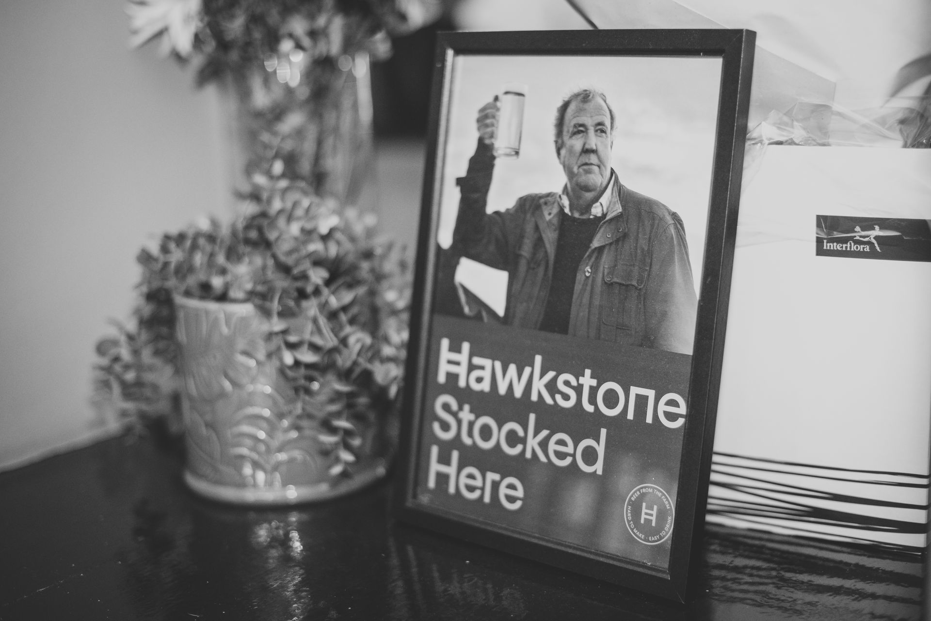 Black and white framed sign: 