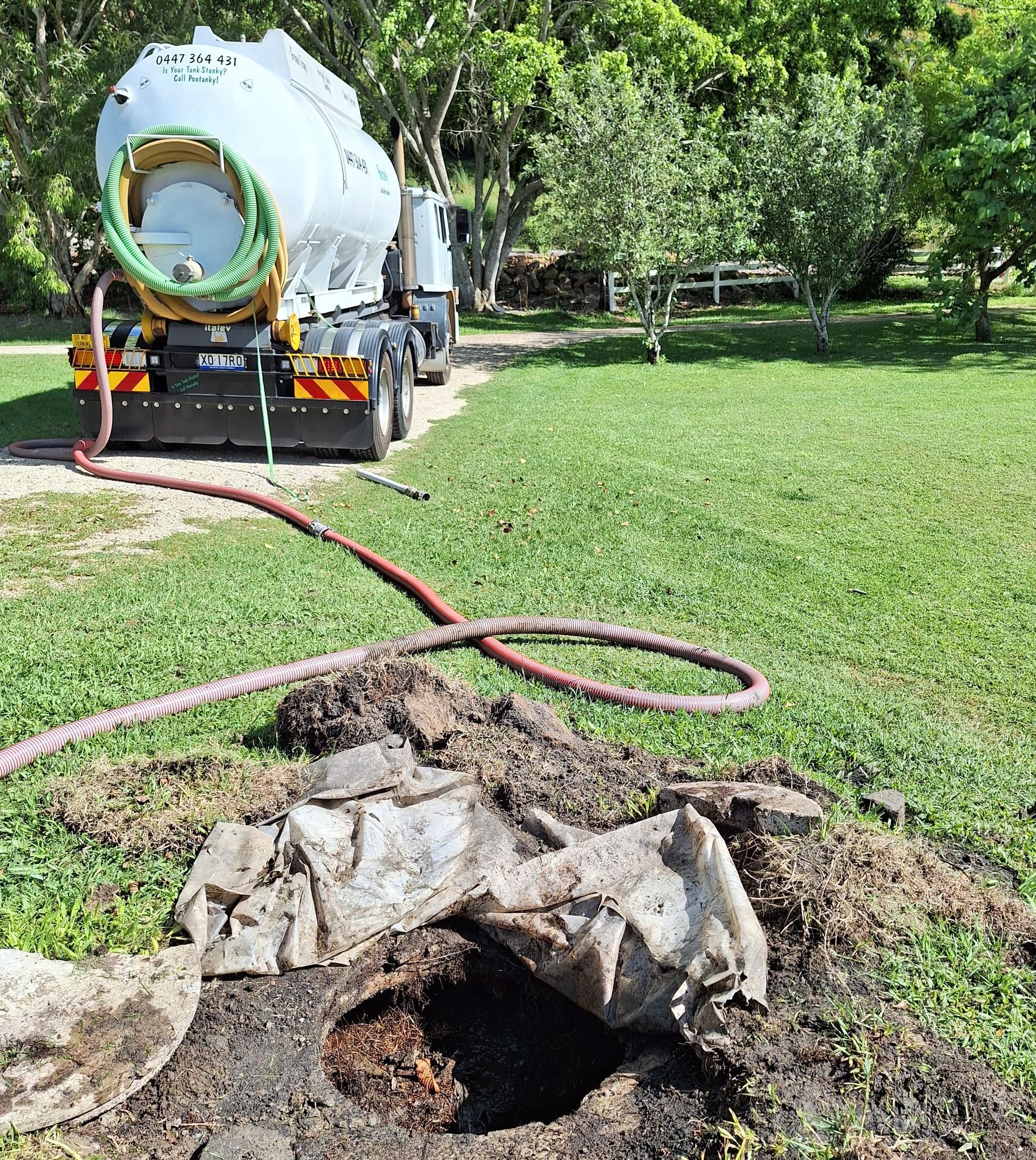 A Group Of Boats Are Docked In A Marina At Sunset — Pootanky Murwillumbah, NSW