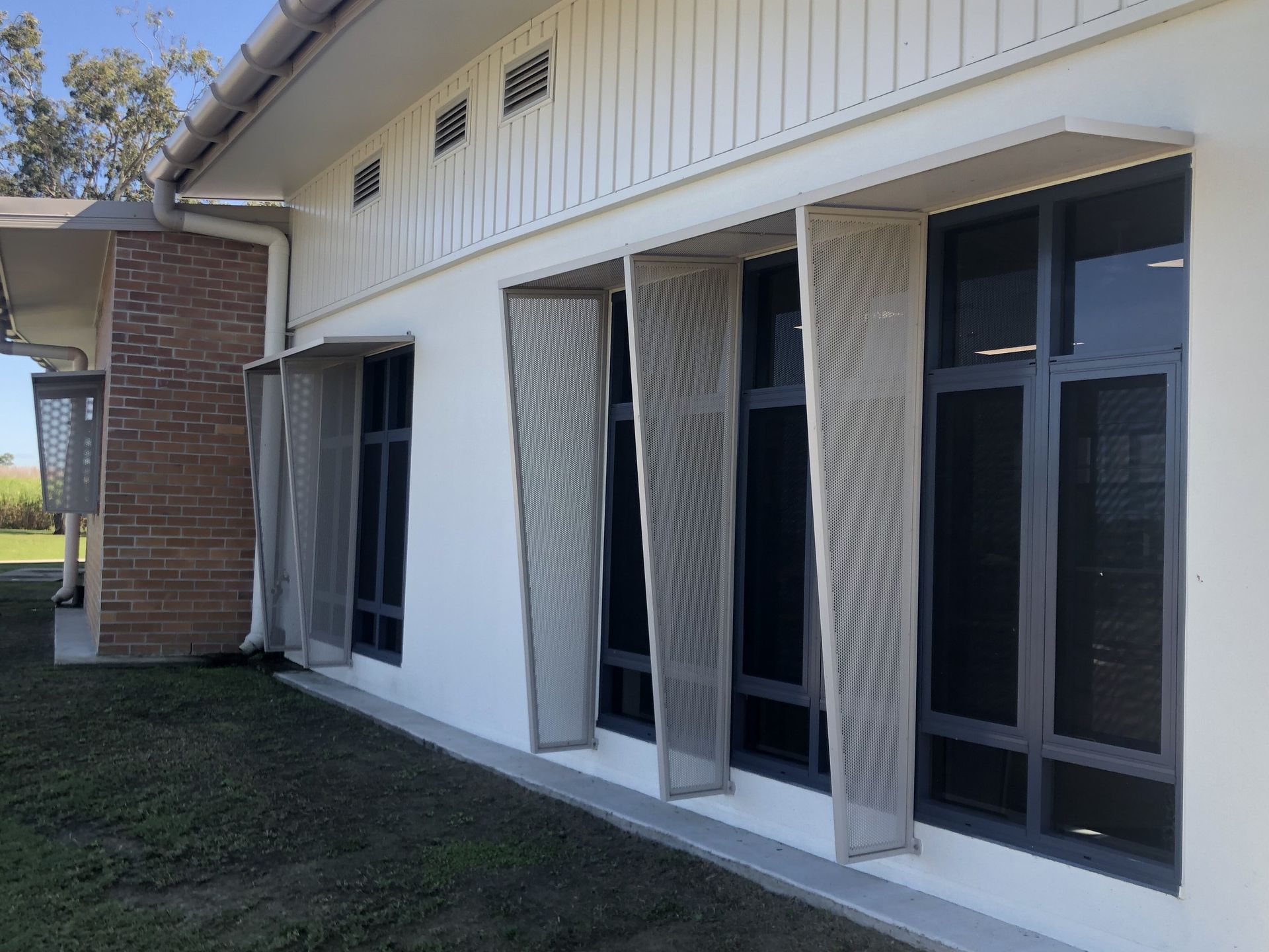 Building Exterior With Windows, Light-colored Walls — Lifestyle Aluminium Lattice in West End, QLD
