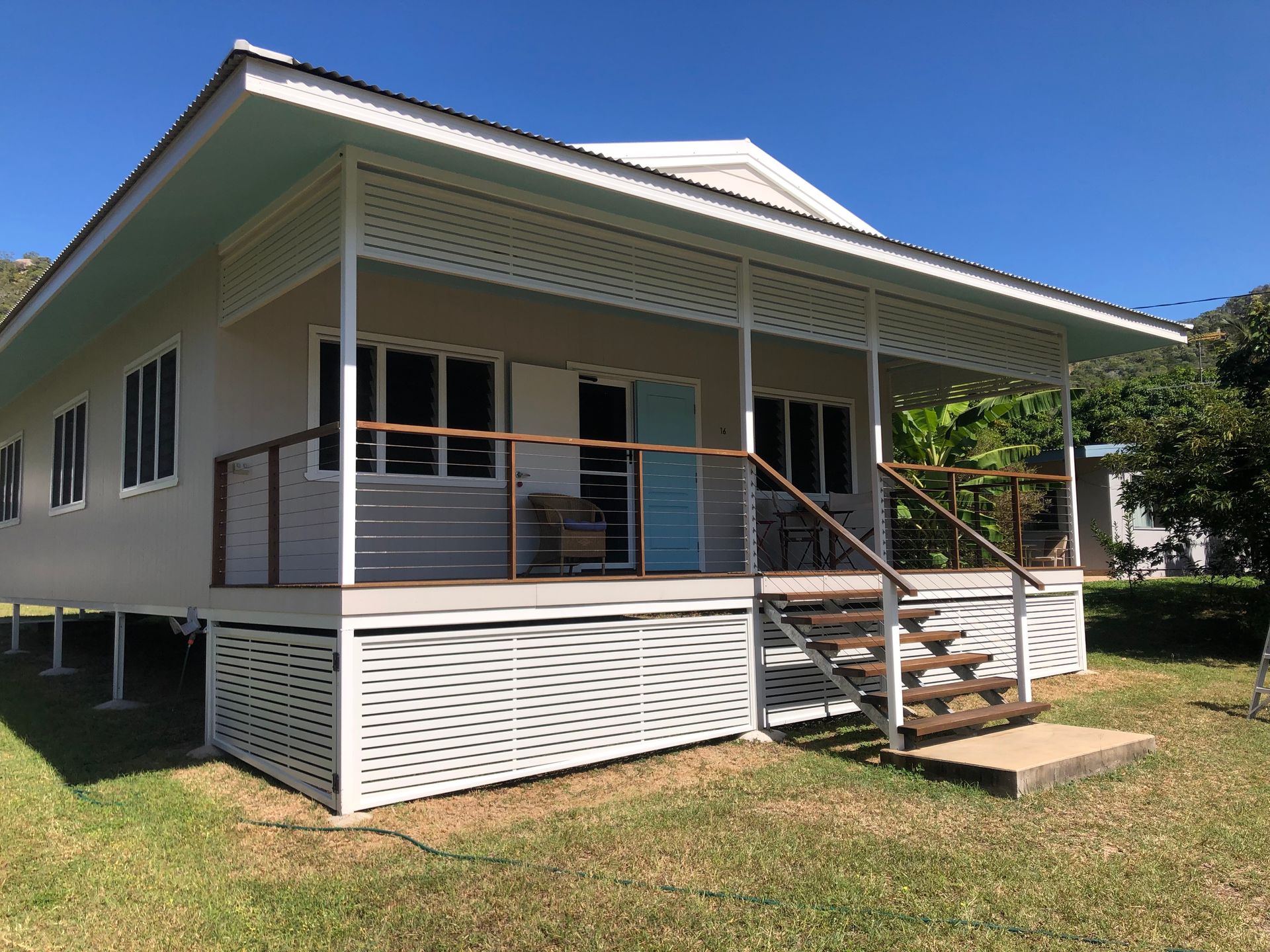 Hikers With Backpacks on a Mountain at Sunset — Lifestyle Aluminium Lattice in Rasmussen, QLD