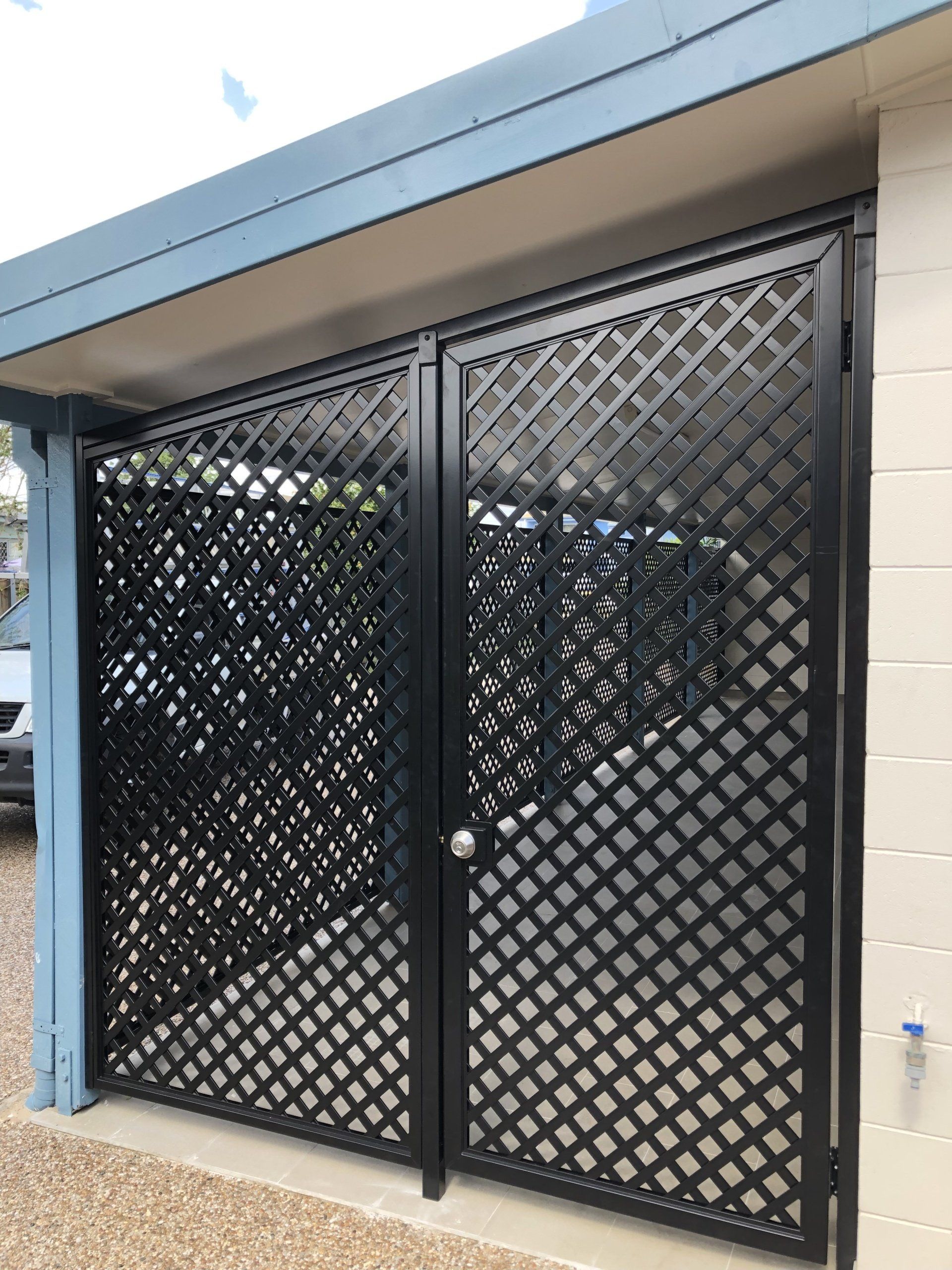 Black Metal Security Doors With Diamond Grid Pattern — Lifestyle Aluminium Lattice in West End, QLD