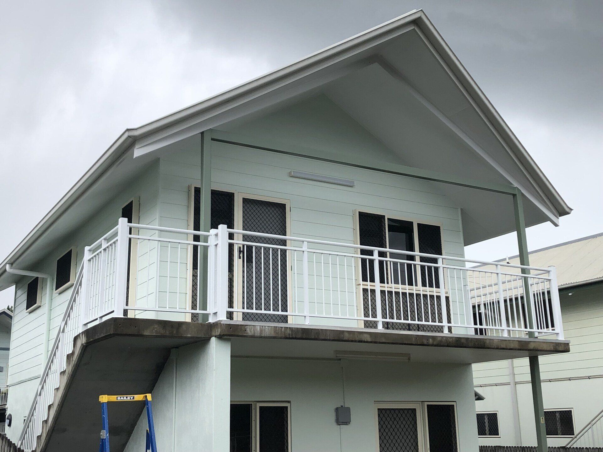 Light Green/Blue Combination House And White Lattice — Lifestyle Aluminium Lattice in West End, QLD