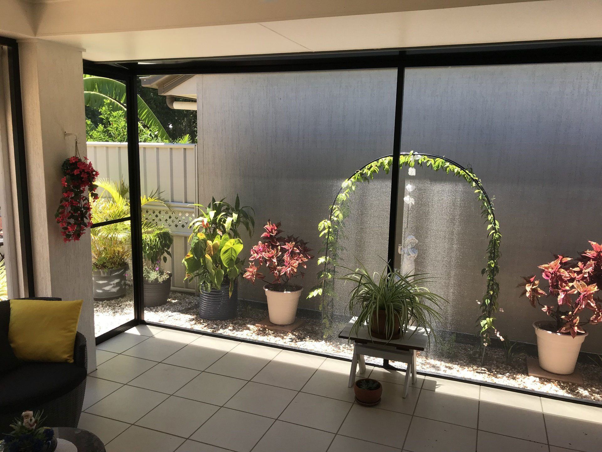Inside view of patio enclosure with insect screen mesh