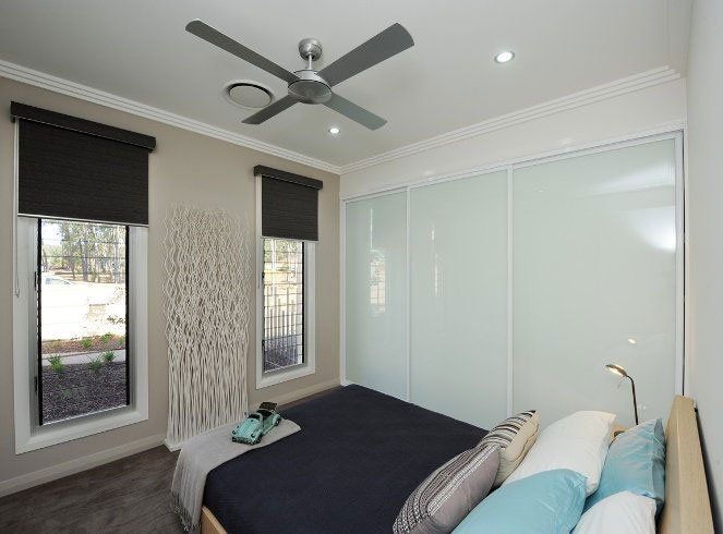 Image of white glass sliding wardrobe doors