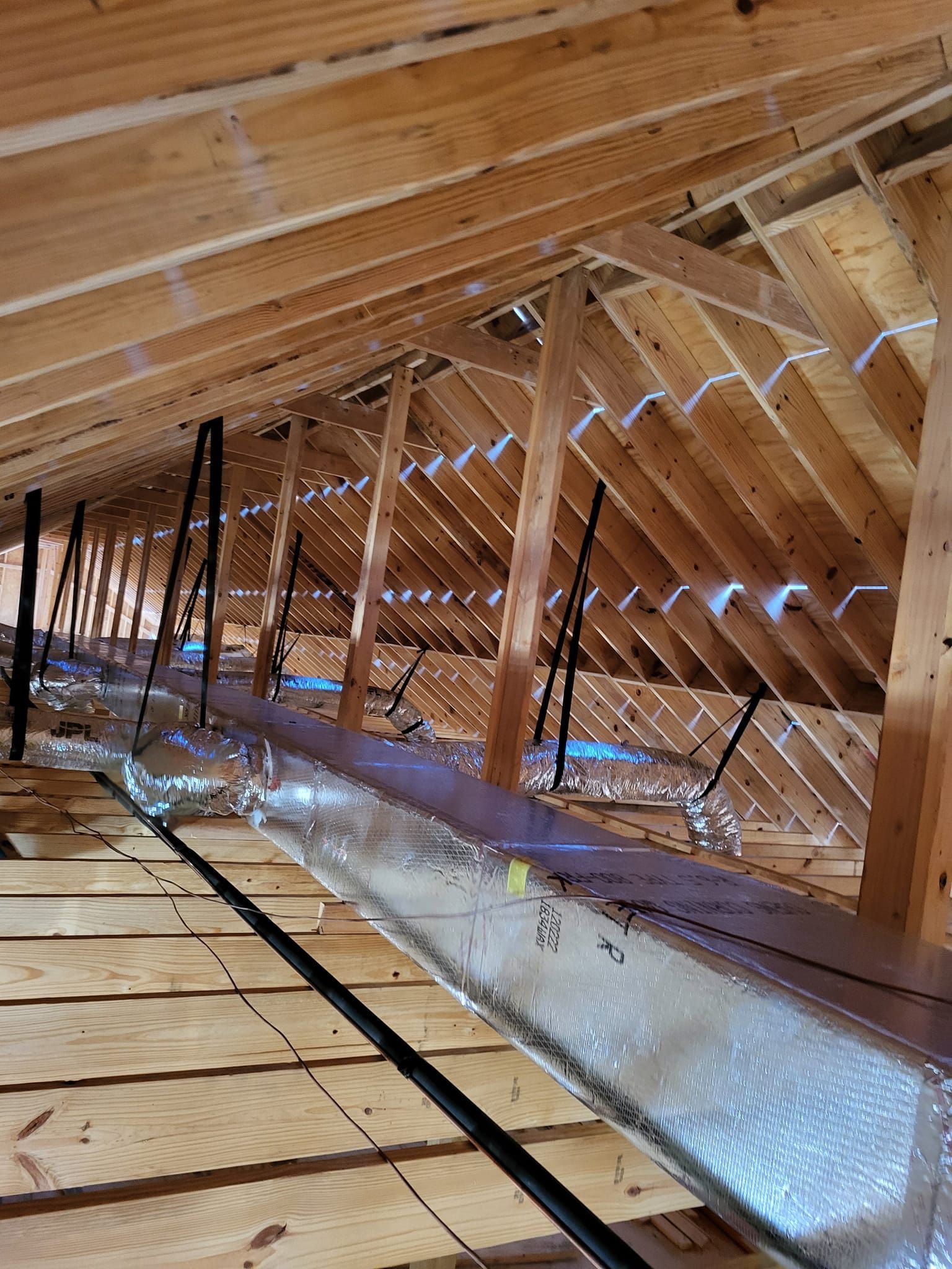 Looking up at the ceiling of a house under construction.