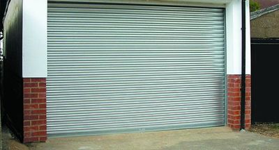 Manual and power operated roller shutters