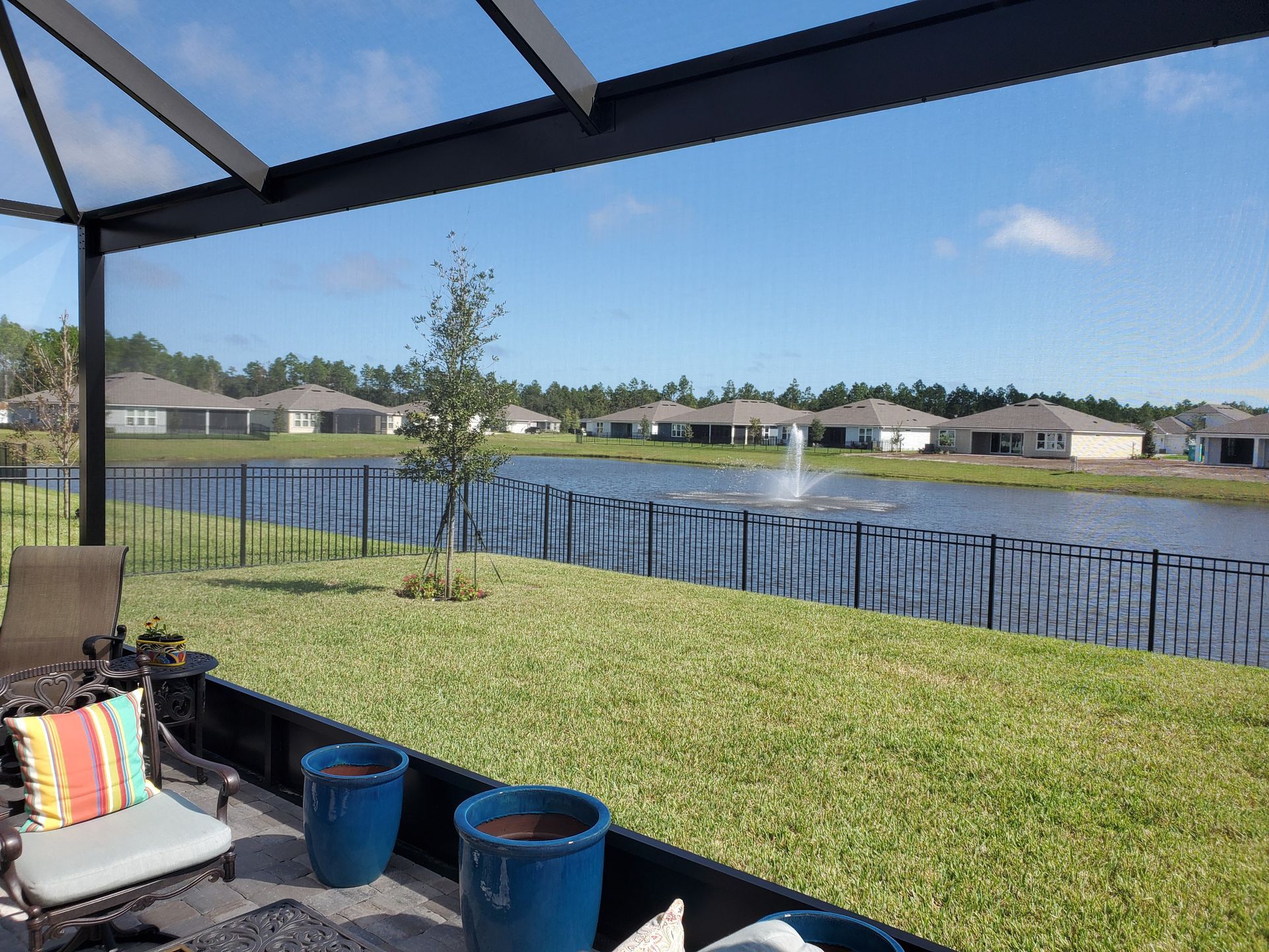 Front Yard With Man Made Water — Orange Park, FL — Backyard Creations