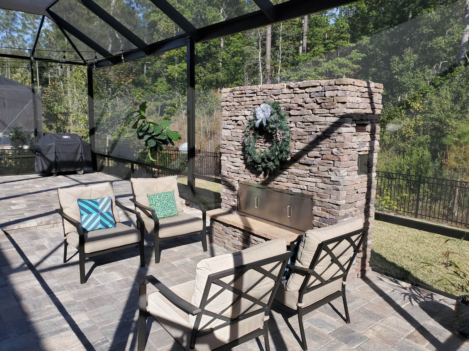 Screen Enclosures With Fireplace One | Jacksonville, FL | Backyard Creations
