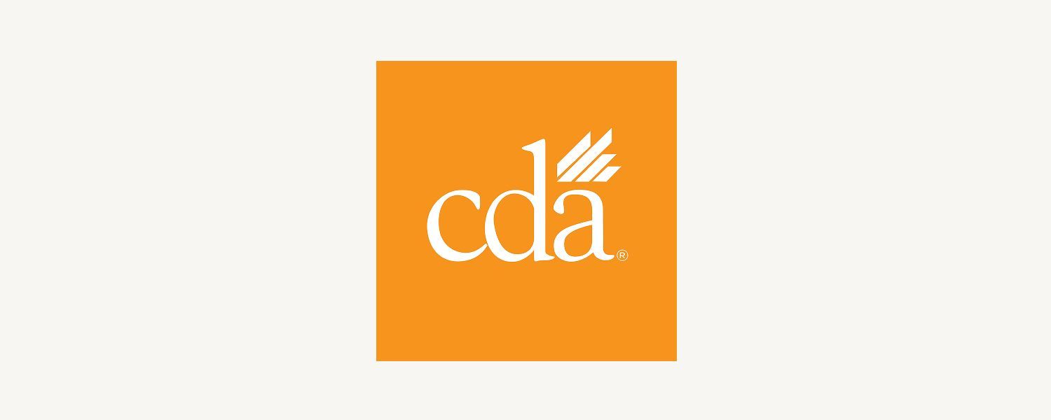 The cda logo is orange and white on a white background.