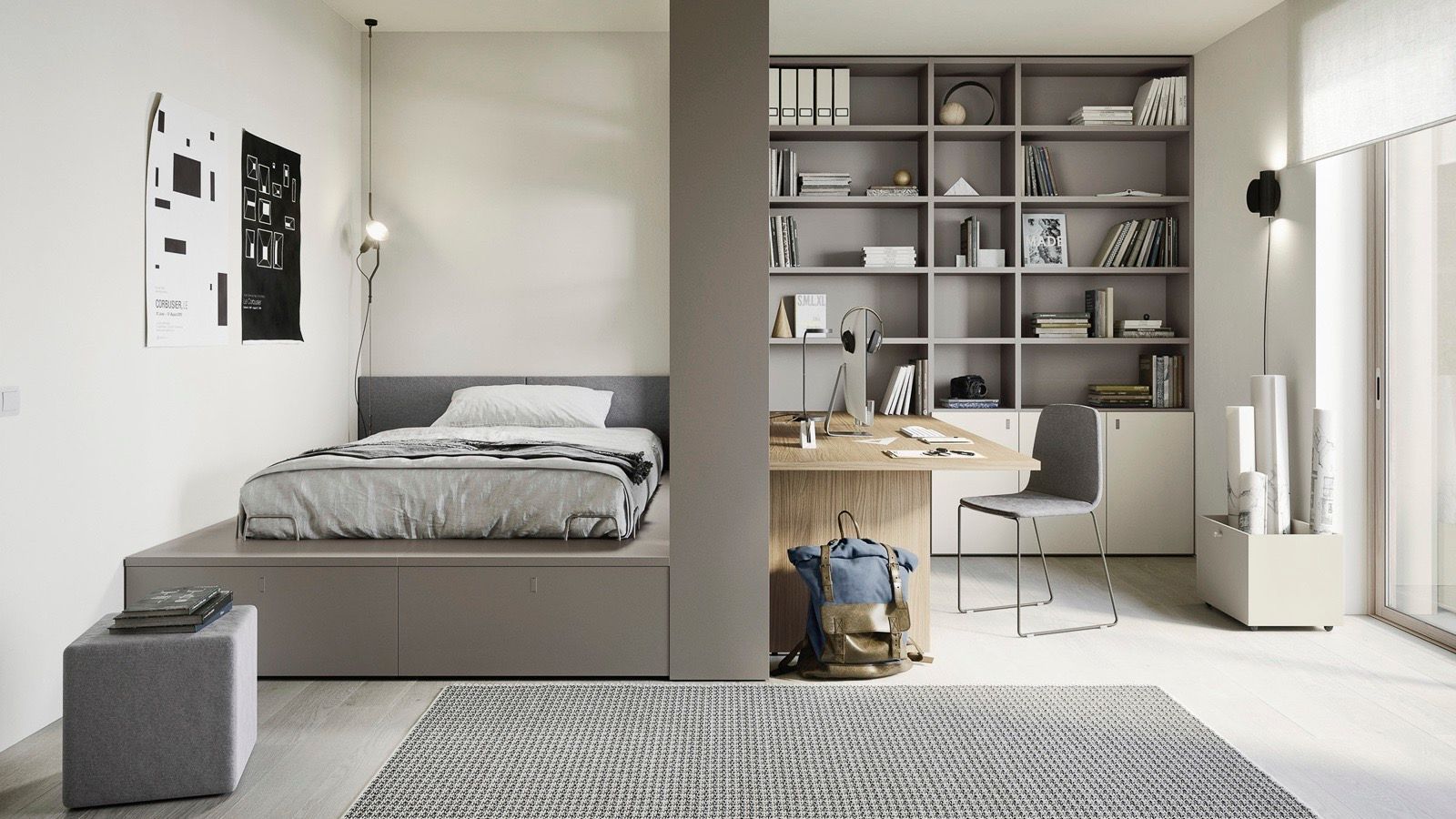 Camera da letto con letto rialzato, scrivania e libreria. I toni del grigio dominano lo spazio moderno.