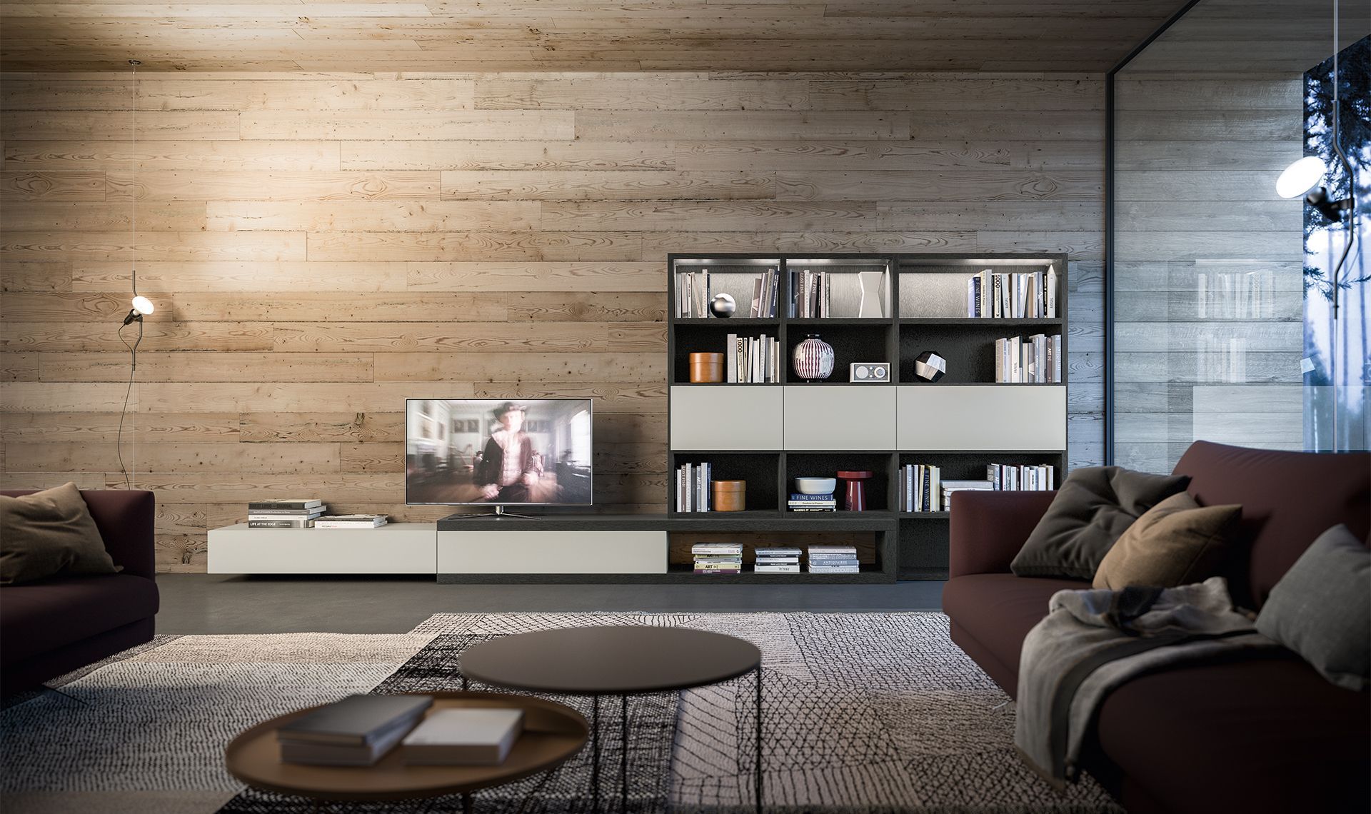 Soggiorno moderno con divani color bordeaux, TV e libreria integrata contro una parete strutturata.