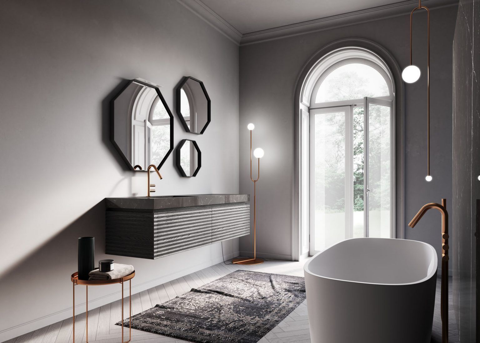 Moderno bagno grigio con mobile lavabo sospeso, vasca ovale, finestra ad arco e accessori dorati.