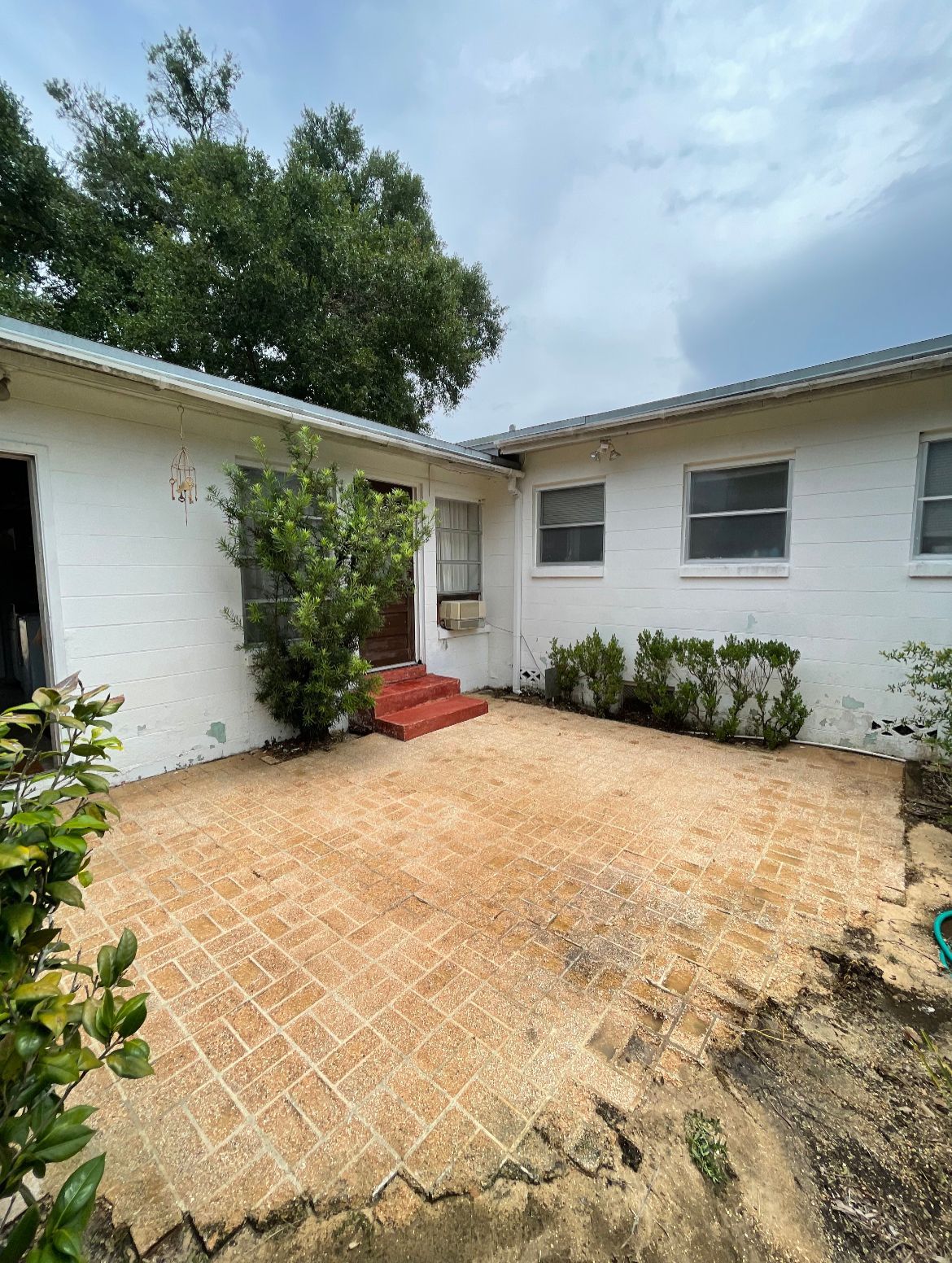 Nice backyard area with concrete floor — Orlando, FL — Power House Wash