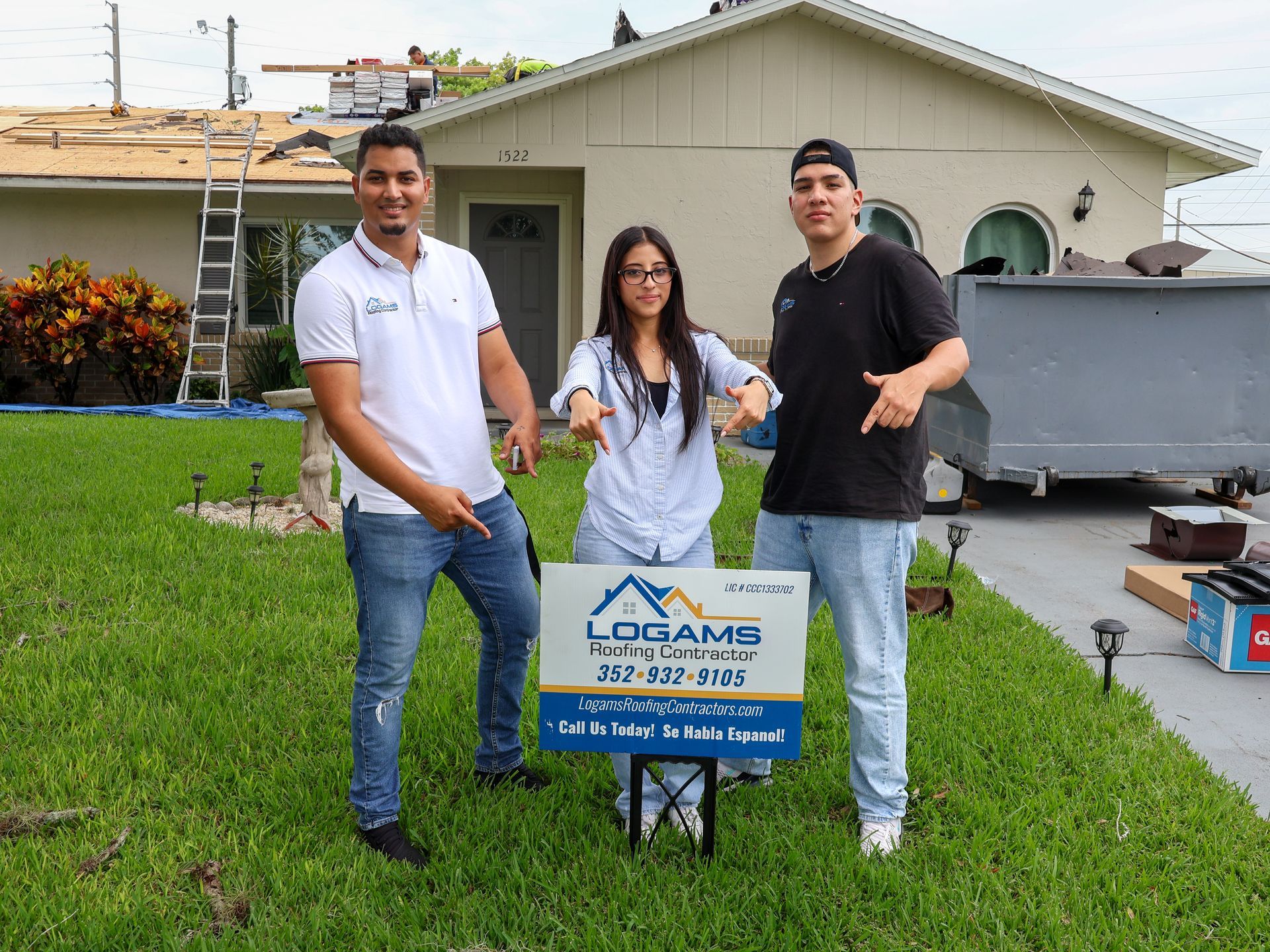 Logams Roofing Contractors team standing in front of a residential project in Ocala, Florida, showcasing professional roofing service and customer satisfaction.