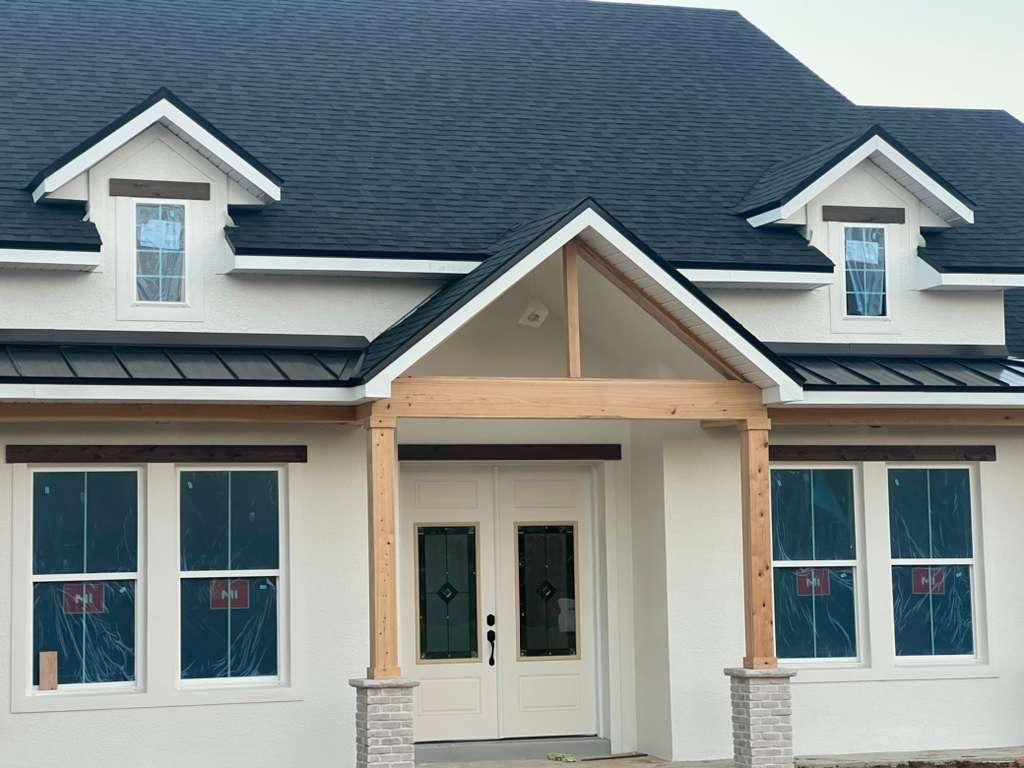 Metal roof installation on a residential home in Florida, designed for durability and protection against heavy rain and storms