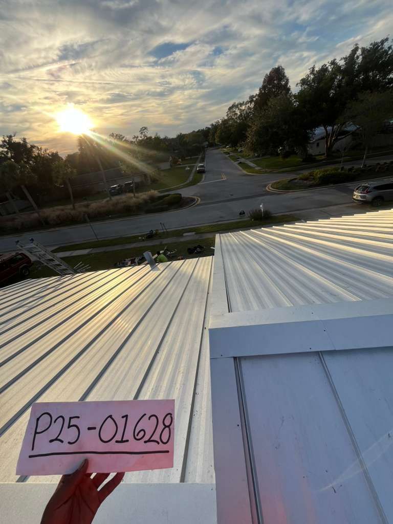 Standing seam metal roofing installation on a St. Cloud, Florida home, engineered for 160+ mph wind resistance and superior energy efficiency under Central Florida’s intense sun.