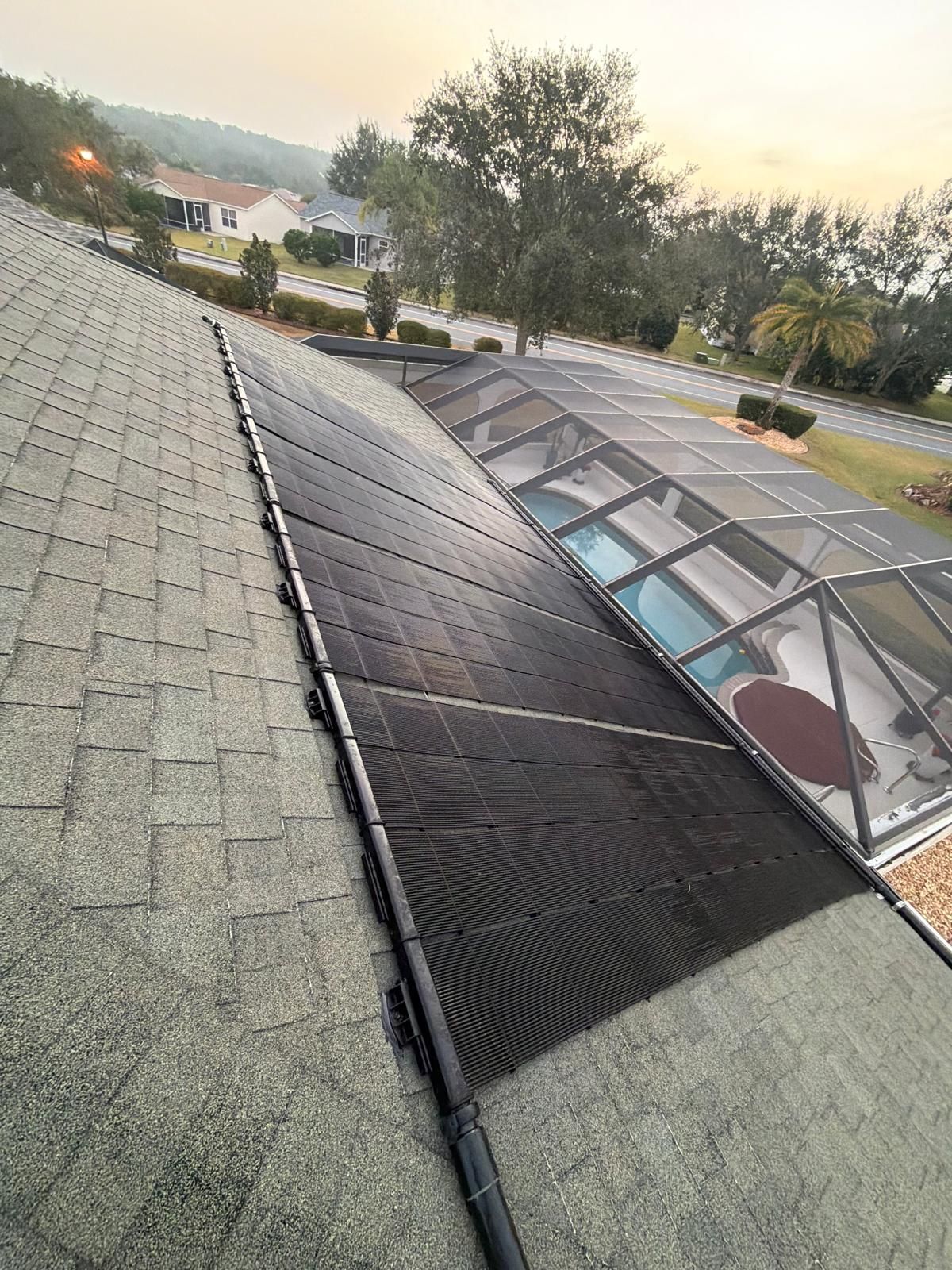 Florida shingle roof showing aging and granule loss — example of roof condition that increases replacement cost projections for 2026.