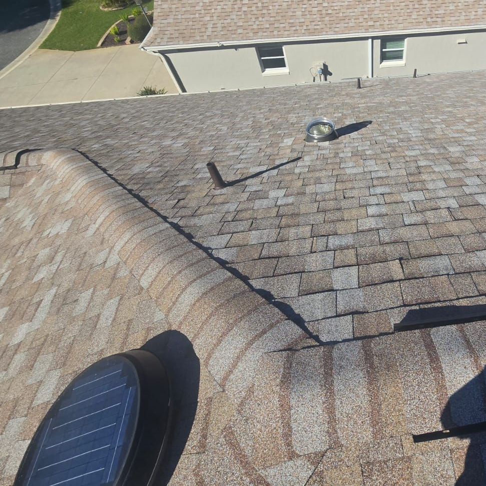 Florida shingle roof showing aging and granule loss — example of roof condition that increases replacement cost projections for 2026.