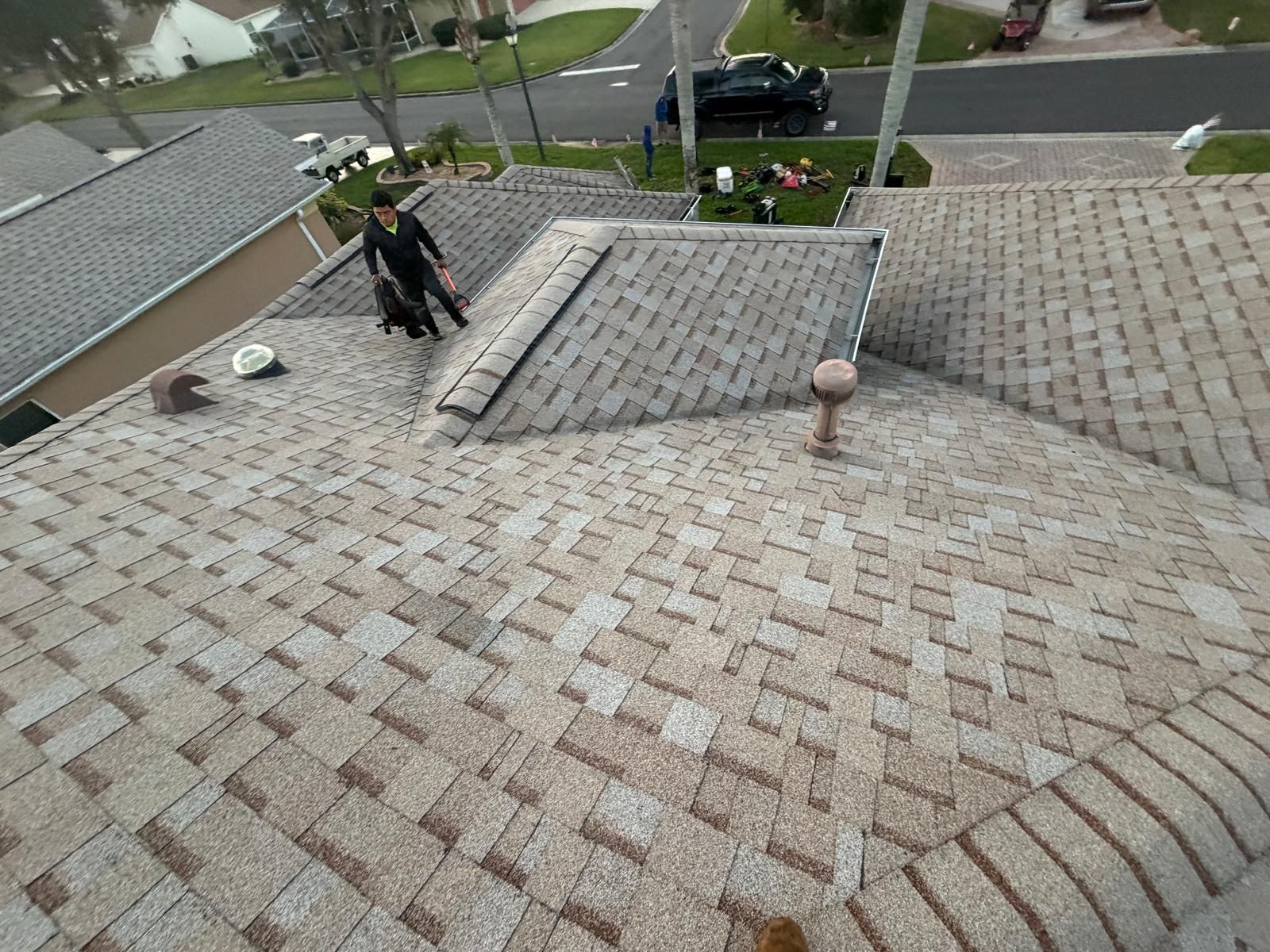 Residential roof replacement in Haines City FL showing new shingle installation on a home.