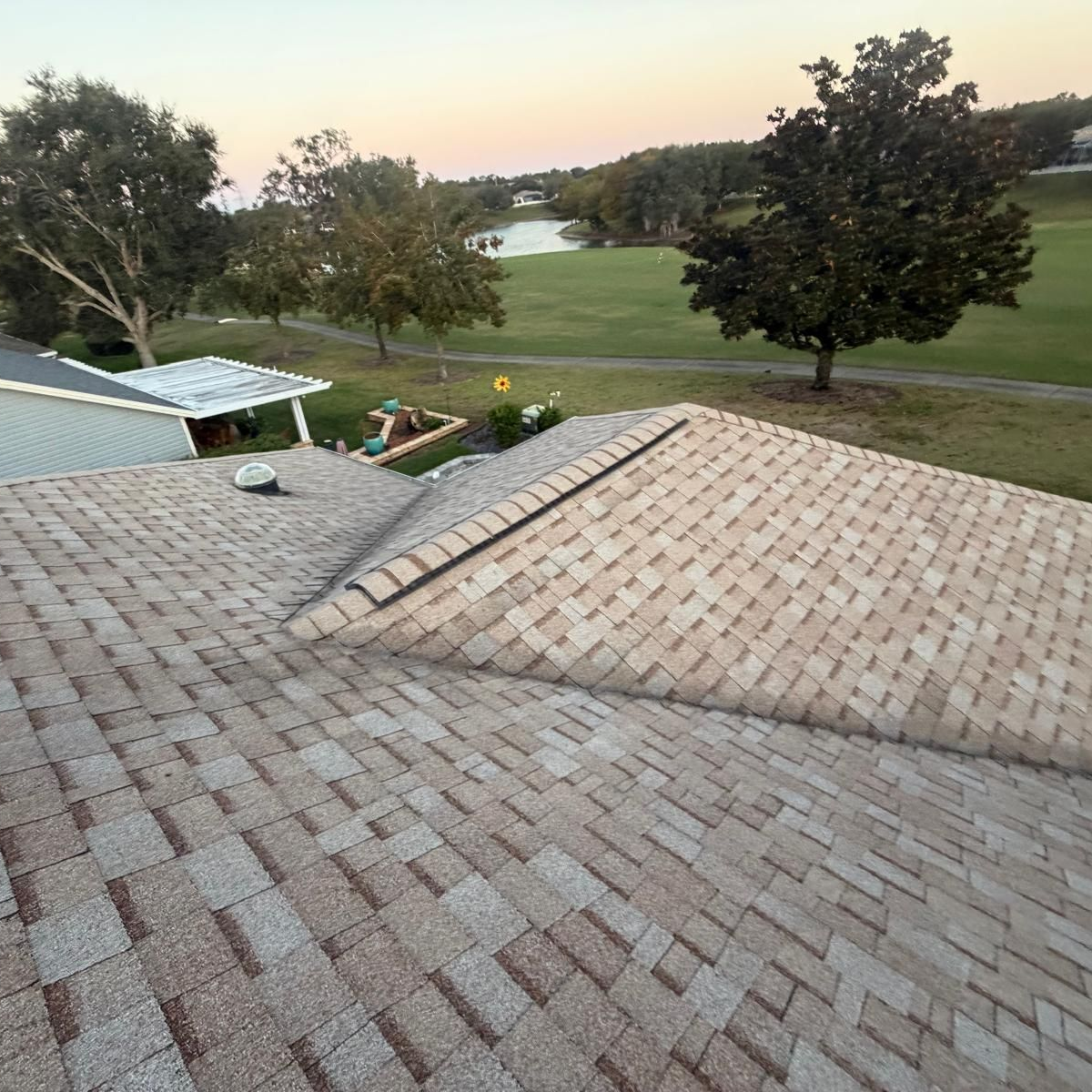 Top view of a Clermont Shingle Roof, showing residential neighborhoods, golf course communities, and lakefront properties around Lake Minneola and South Lake.