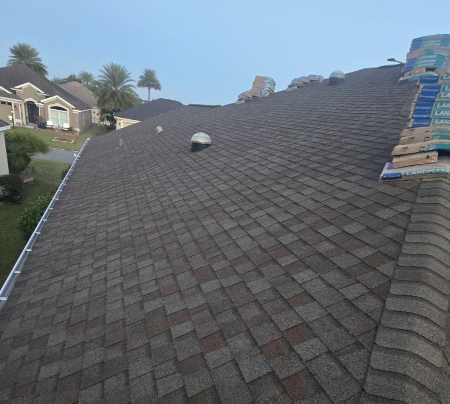 Shingle roof installation on a home in Clermont, FL, showing new architectural shingles installed by a trusted local roofing company.