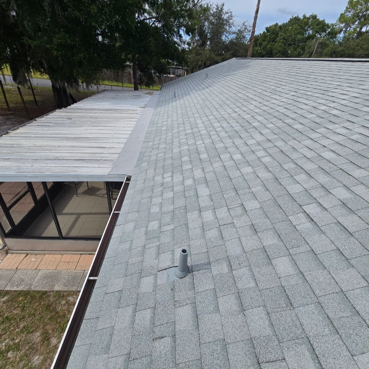 New shingle roof installation in Lakeland, FL, with upgraded underlayment and shingles installed by Clermont roofing specialists.